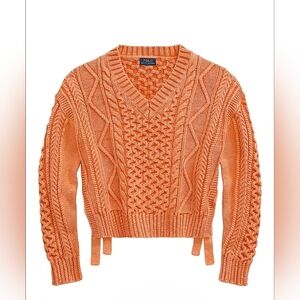 Polo Ralph Lauren's cropped sweater crafted in a cable-knit construction with